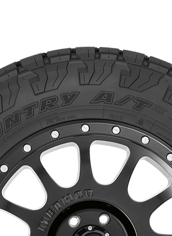 Toyo's all terrain, all weather light truck tire-side view.