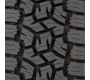 Toyo's all terrain all weather light truck tire has stone ejectors.